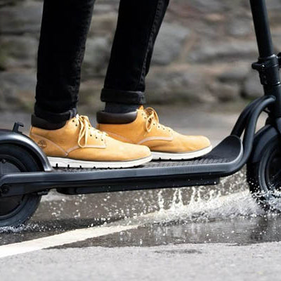 Are Electric Scooters Waterproof & Can You Ride Them In The Rain?
